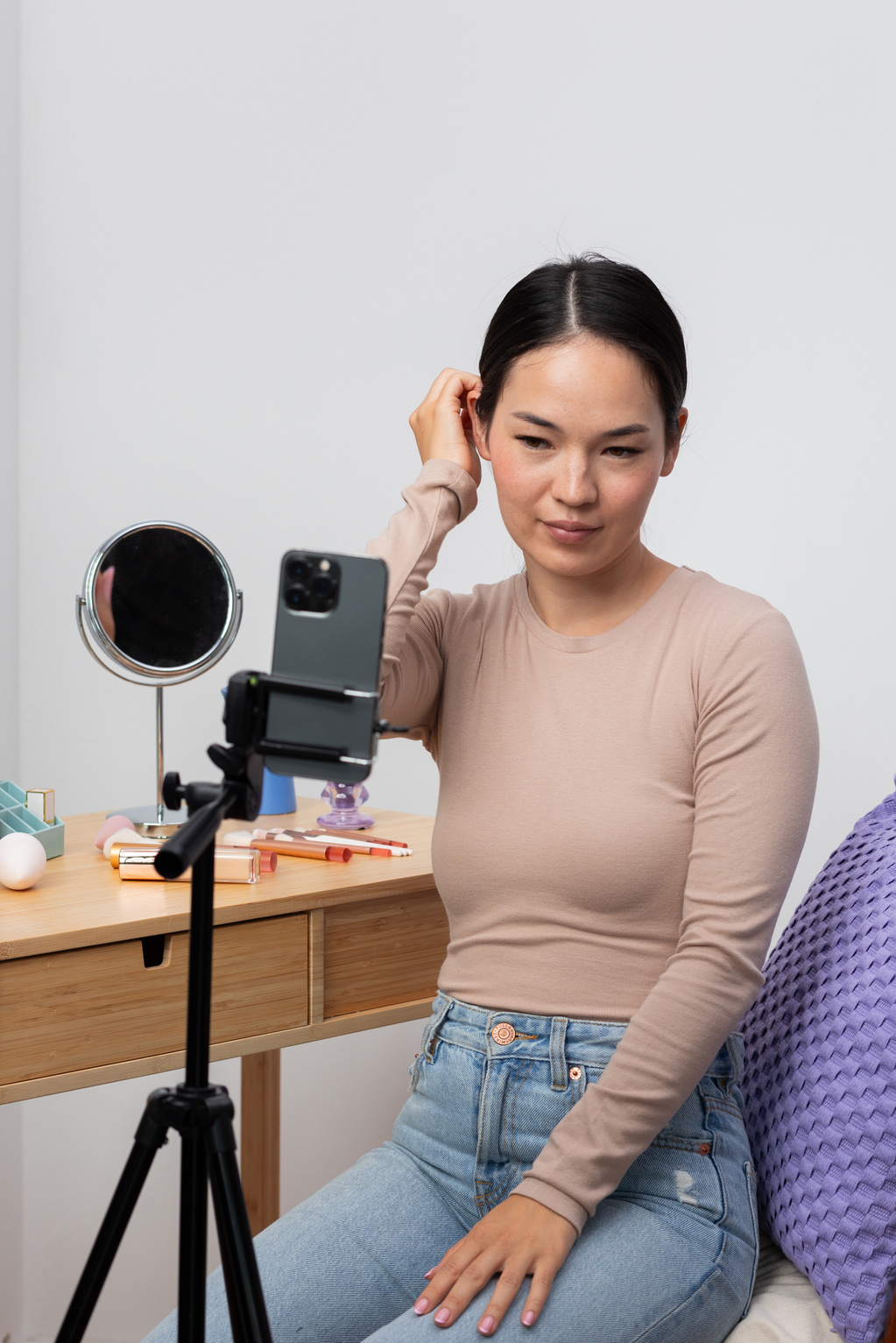 Woman Setting Her Smartphone for Video Recording
