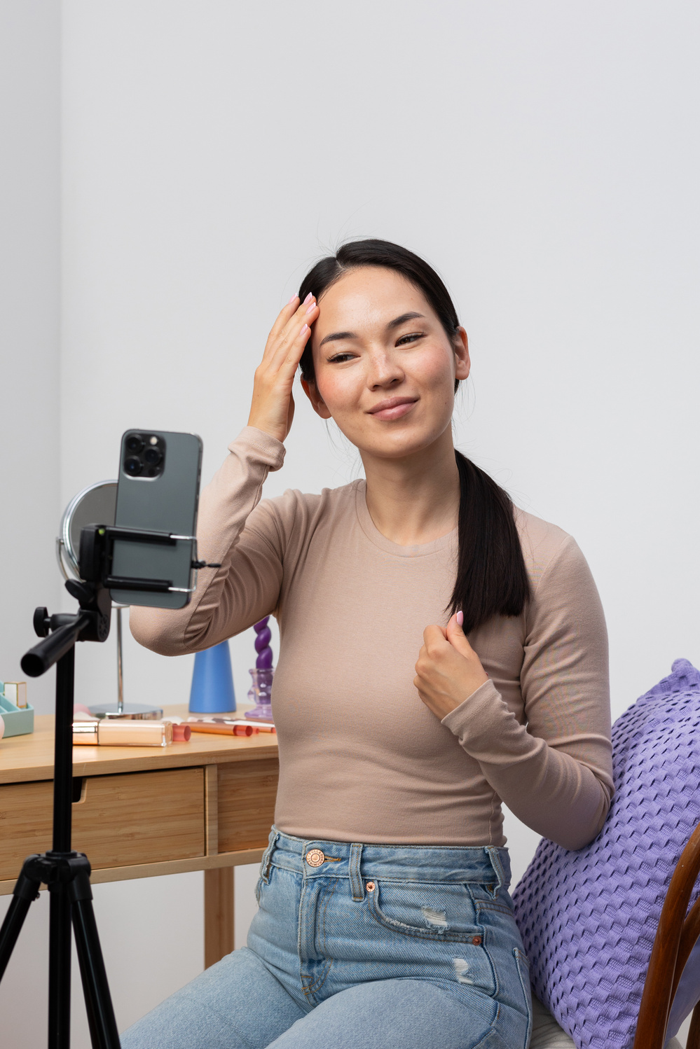 Woman Getting Ready Before Recording on Smartphone
